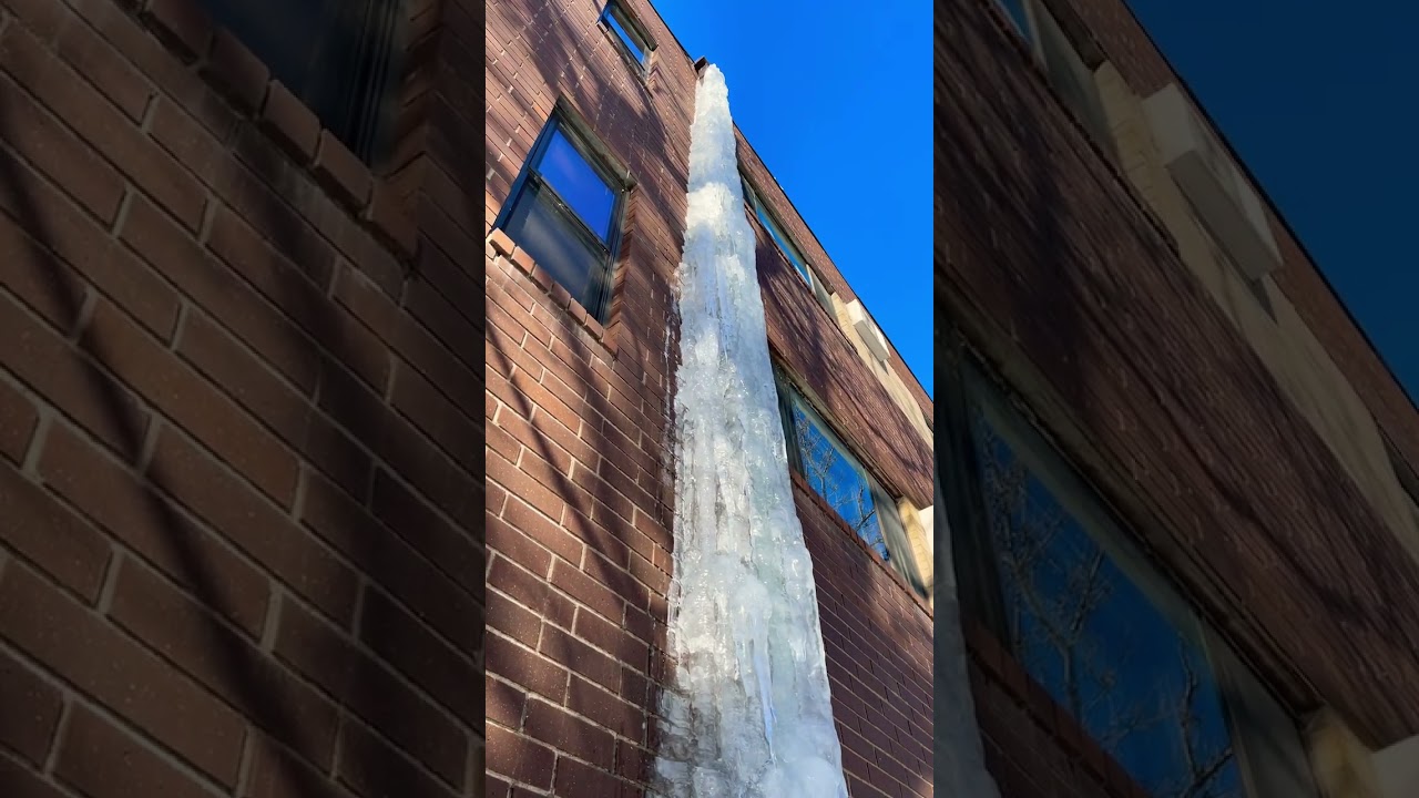 Crazy Huge Icicle Hanging From Building 