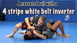 Rolling with a 4 stripe white belt who likes to invert