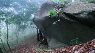 Hiking, building shelter under a giant rock cavity to protect from the rain