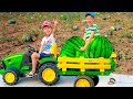 Damian and Darius Ride on 12 volt Tractor toys and found some watermelons always helping each other