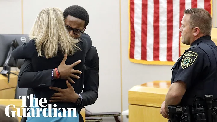 Botham Jean's brother hugs ex-officer Amber Guyger...