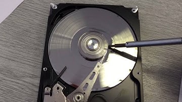 Scratching surface of a faulty hard drive.