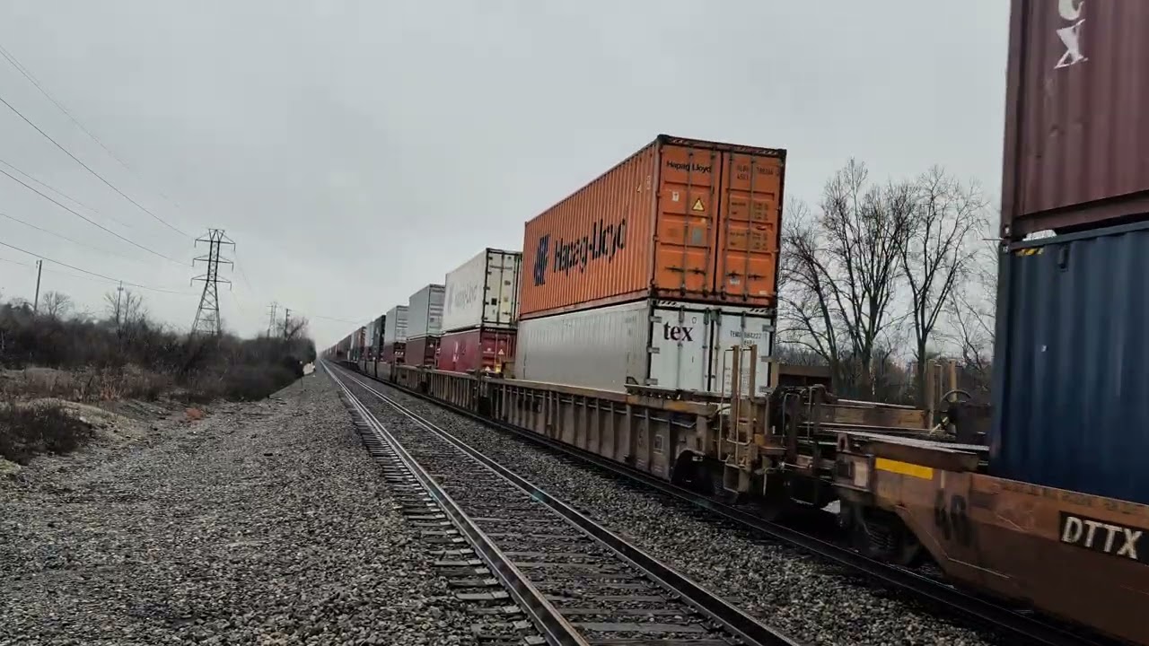 A trio of AC44C6Ms hauling a NS intermodal train.