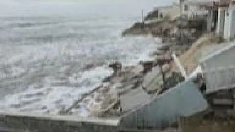 Tropical Storm Nicole topples beachfront homes