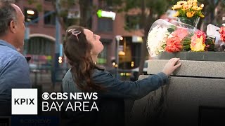 Fans leaving flowers at Willie Mays Plaza in honor of San Francisco Giants legend