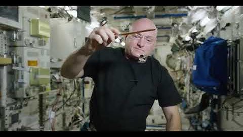 "#SpaceBalletMarvels Microgravity Marvels: Liquid Ping Pong Ball Dance on the Space Station