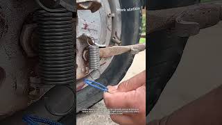Handy Cord Trick to Hook a Brake Spring Back On #worker #process #mechanic #repair #tips