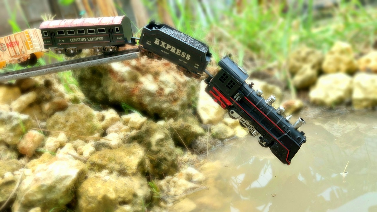 Steam train plunges into river