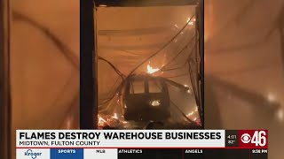 Flames destroy warehouse businesses