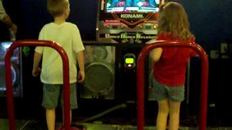 Hayden and Jaylinn Playing DDR at Boomers in Fl
