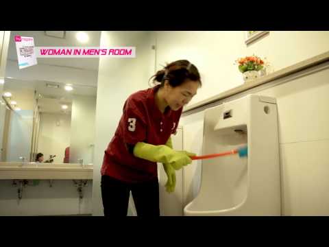 Woman in men's room
