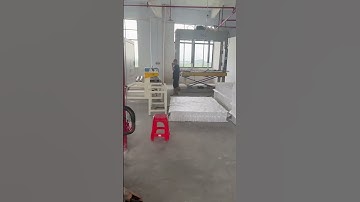 Mattress compression rolling wrapping machine