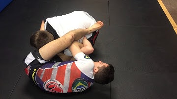 Limitless BJJ: Kimura to reverse triangle.