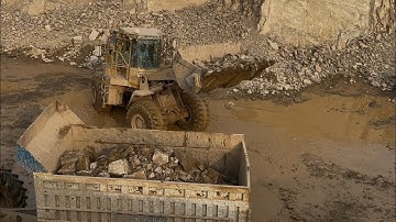 Dumper & trolley Stone loading with Caterpillar Loader in mountain | Black Stone here 