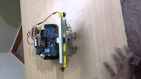 AUTOMATIC OBSTACLE DETECTING AND OPTIMUM LINE FOLLOWER ROBOT