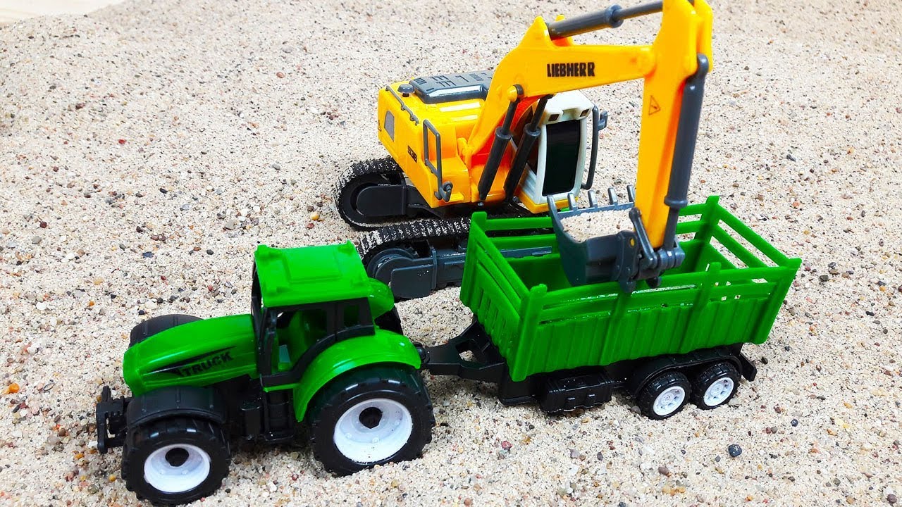 Spielzeug für Kinder: Bagger und Traktoren bauen ein ...