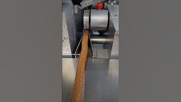 Caramels being wrapped.