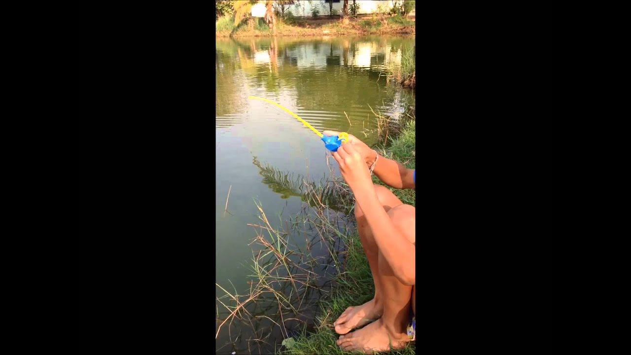 Boy Catches Fish...With A Toy Fishing Pole ViralHog YouTube