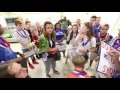 Olympian Sydney McLaughlin greeted at airport by classmates