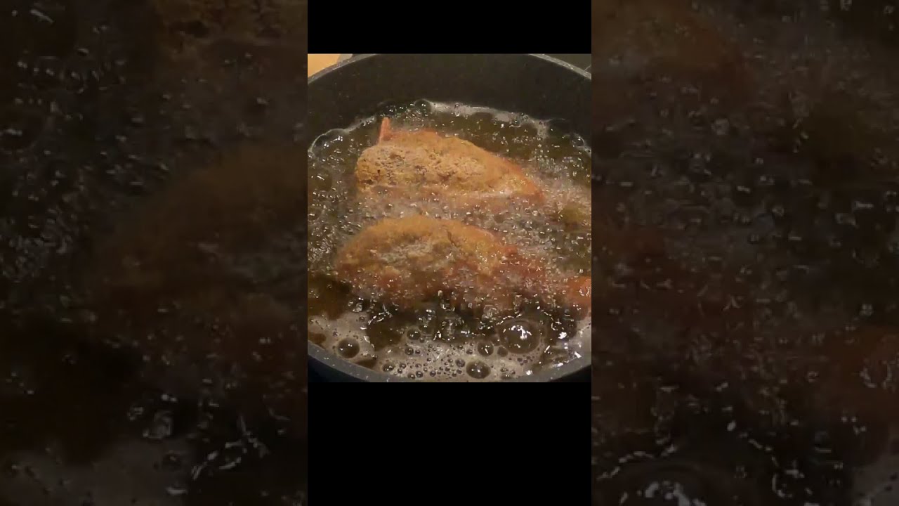 Frying Fish in a Cast Iron Pan 