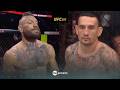 Conor McGregor & Max Holloway staredown across the Octagon at #UFC329