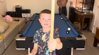 Seven. Year-old beat Dad at pool table