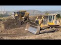 Amazing Team Of Caterpillar D9T And Komatsu D275AX Bulldozers Working Together On Huge Mining Site