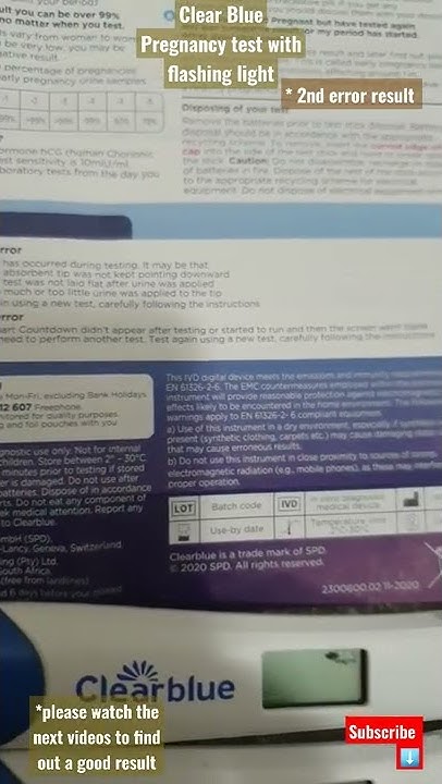 Clear blue digital pregnancy test arrow pointing book