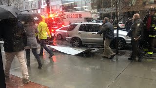 Wind rips off part of Boston building onto Boylston Street in Boston