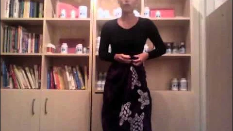 How to tie a Tahitian pareo with the roll