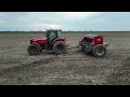 Mf 7140 e Case 130A no plantio do arroz