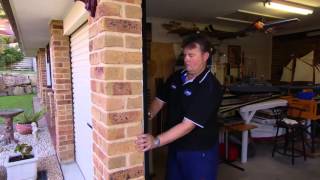Roller garage door side seal