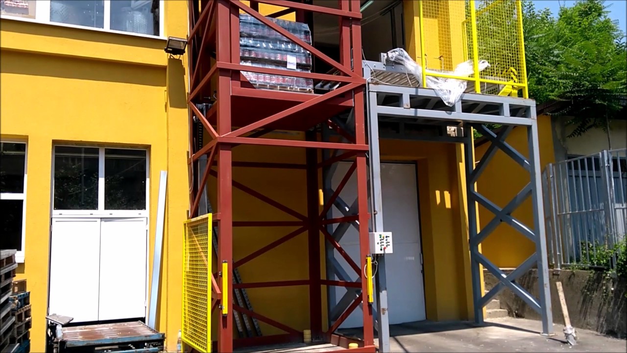 Pallet Elevator with Integrated Roller Conveyor YouTube