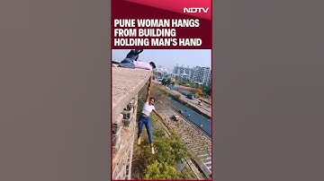 Pune Woman Hangs From Building Holding Man