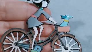 Pretty Girl Riding Bicycle with Dog Enamel Brooch Pins Pretty Girl Riding Bicycle with Dog Enamel Brooch Pins