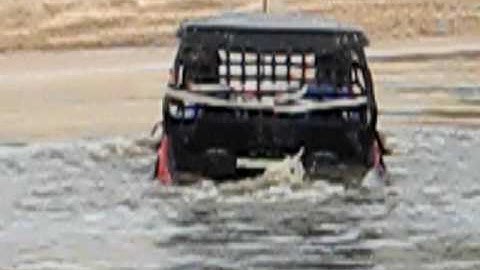 Polaris RZR in deep water