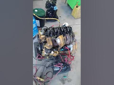 Starting a John Deere 4024T engine on floor - YouTube