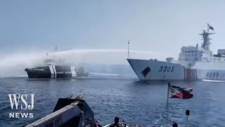 Chinese Coast Guard Blasts Philippine Boats With Water Cannons | WSJ News