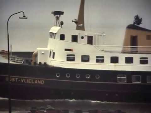 Aankomst van coaster Markborg in Harlingen, met loods Piet Kooyman en kok Oene de Jong, kerst 1975.