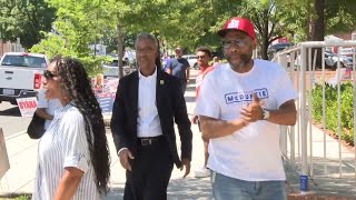Kenyan McDuffie spends election day talking to voters at polling places