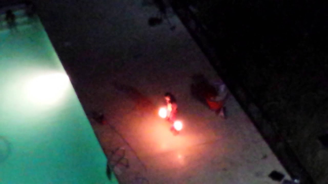 Hawaiian man doing the fire dance!