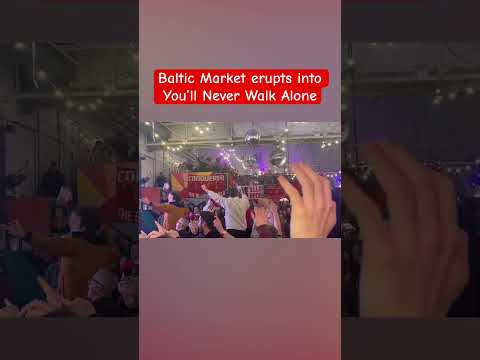 Liverpool fans watching the Carabao Cup from Baltic Market sing You'll Never Walk Alone.