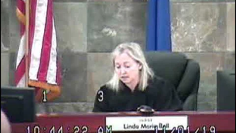 Kim Blandino in front of Linda Bell Chief Judge Cl...