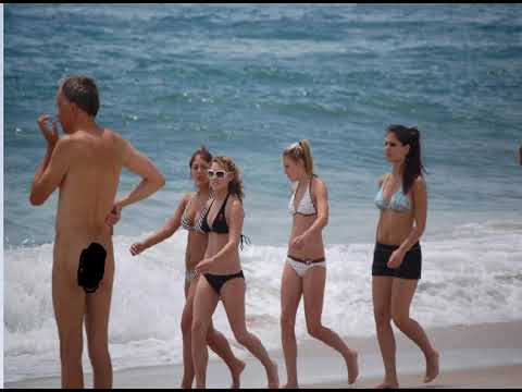 Nude beach Naked man among clothed girls CFNM on beach , playa nudista, un hombre con muchas mujeres