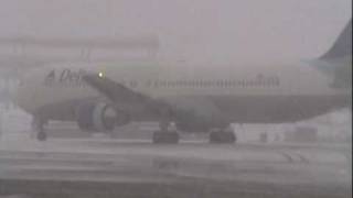 Airlines de-icing outbound aircraft at Hartsfield-Jackson Atlanta International Airport
