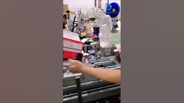 Automatic robot hand feeding game controller encasing cartoning machine toy carton box sealing line