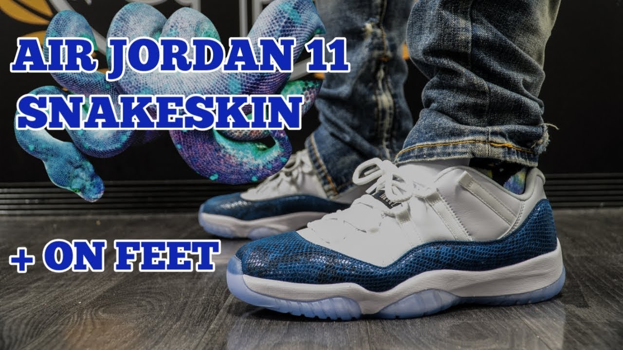 jordan 11 low blue snakeskin on feet