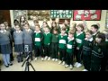 The firs school choir performs sing noel