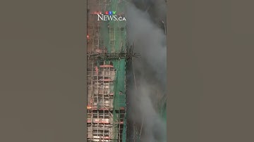 13 people killed in fire engulfing Hong Kong high-rise residential buildings