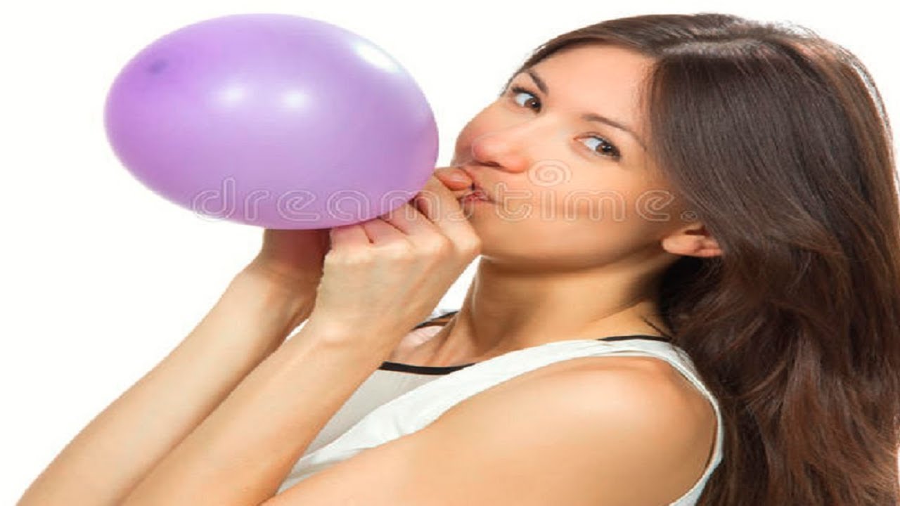 Girl Sitting In Sofa Trying To Play balloon Pop